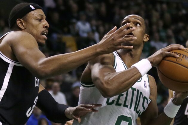 Brooklyn Nets forward Paul Pierce, left, defends Boston Celtics guard Rajon Rondo on a drive to the basket during the first quarter of an NBA basketball game, Friday, March 7, 2014, in Boston. (AP Photo/Charles Krupa) Brooklyn Nets forward Paul Pierce, left, defends Boston Celtics guard Rajon Rondo on a drive to the basket during the first quarter of an NBA basketball game, Friday, March 7, 2014, in Boston. (AP Photo/Charles Krupa)