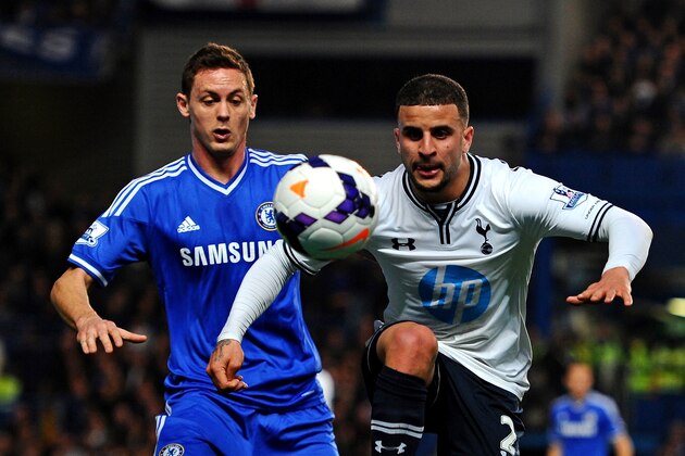 LONDON, ENGLAND - MARCH 08:  Kyle Walker of Spurs controls the ball under pressure from Nemanja Matic of Chelsea during the Barclays Premier League match between Chelsea and Tottenham Hotspur at Stamford Bridge on March 8, 2014 in London, England.  (Photo by Mike Hewitt/Getty Images)