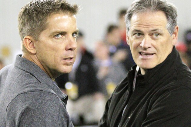 New Orlenas Saints head coach Sean Payton, left, and general manager Mickey Loomis look on during LSU's NFL football pro day in Baton Rouge, La., Wednesday, March 27, 2013. (AP Photo/Sean Gardner)