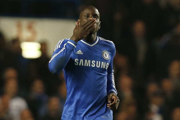 Chelsea's Demba Ba celebrates his goal against Tottenham Hotspur during their English Premier League soccer match at Stamford Bridge, London, Saturday March 8, 2014. (AP Photo/Sang Tan)