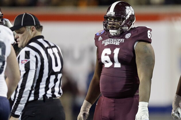 Mississippi State offensive linesman Gabe Jackson (61) lines up against Rice in the fourth quarter of the Liberty Bowl NCAA college football game on Tuesday, Dec. 31, 2013, in Memphis, Tenn. Mississippi State won 44-7. (AP Photo/Mark Humphrey)