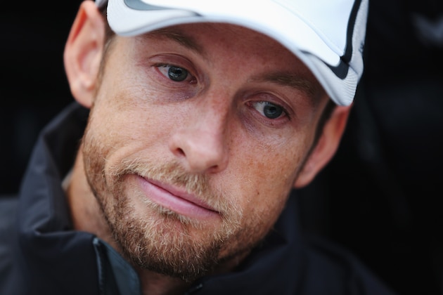 JEREZ DE LA FRONTERA, SPAIN - JANUARY 29:  Jenson Button of Great Britain and McLaren is interviewed by the media following day two of Formula One Winter Testing at the Circuito de Jerez on January 29, 2014 in Jerez de la Frontera, Spain.  (Photo by Mark Thompson/Getty Images)