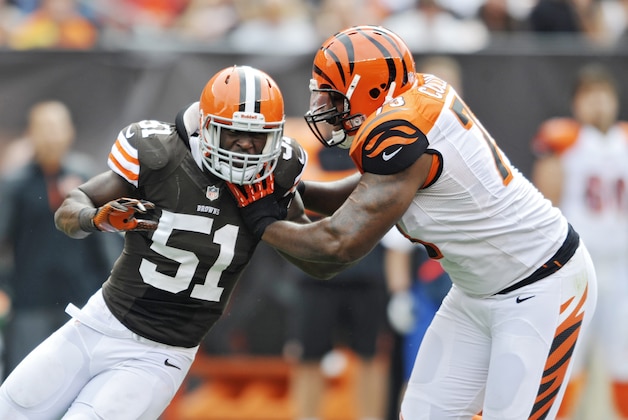 Cleveland Browns linebacker Barkevious Mingo (51) rushes against Cincinnati Bengals tackle Anthony Collins in the second quarter of an NFL football game Sunday, Sept. 29, 2013, in Cleveland. (AP Photo/David Richard)