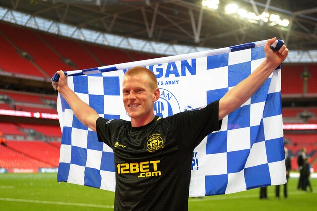 LONDON, ENGLAND - MAY 11:  Goalscorer Ben Watson of Wigan Athletic celebrates victory after the FA Cup with Budweiser Final between Manchester City and Wigan Athletic at Wembley Stadium on May 11, 2013 in London, England.  (Photo by Shaun Botterill/Getty Images)