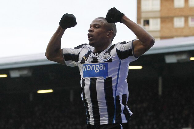 Newcastle United's Loic Remy celebrates his goal against  West Ham United during their English Premier League soccer match at Upton Park, London, Saturday, Jan. 18, 2014. (AP Photo/Sang Tan)