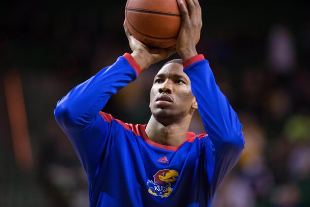 Feb 4, 2014; Waco, TX, USA; Kansas Jayhawks center Joel Embiid (21) warms up before the game against the Baylor Bears at the Ferrell Center. The Jayhawks defeated the Bears 69-52. Mandatory Credit: Jerome Miron-USA TODAY Sports Feb 4, 2014; Waco, TX, USA; Kansas Jayhawks center Joel Embiid (21) warms up before the game against the Baylor Bears at the Ferrell Center. The Jayhawks defeated the Bears 69-52. Mandatory Credit: Jerome Miron-USA TODAY Sports