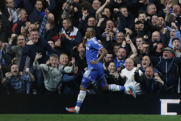 Chelsea's Samuel Eto'o celebrates his goal against Tottenham Hotspur during their English Premier League soccer match at Stamford Bridge, London, Saturday, March 8, 2014. (AP Photo/Sang Tan)