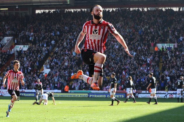SHEFFIELD, ENGLAND - MARCH 09:  John Brayford of Sheffield United celebrates scoring their second goal during the FA Cup Quarter-Final match at Bramall Lane on March 9, 2014 in Sheffield, England.  (Photo by Tony Marshall/Getty Images)