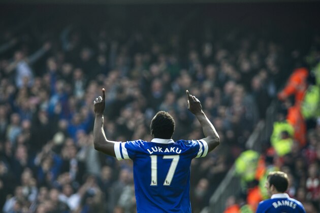 Everton's Romelu Lukaku celebrates after scoring against Arsenal, during their FA Cup quarterfinal soccer match, at Emirates Stadium, in London, Saturday, March 8, 2014. (AP Photo/Bogdan Maran)