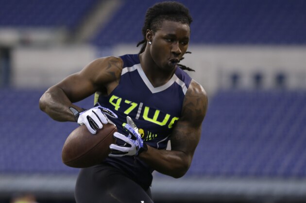 Clemson wide receiver Sammy Watkins makes a catch during a drill at the NFL football scouting combine in Indianapolis, Sunday, Feb. 23, 2014. (AP Photo/Michael Conroy)