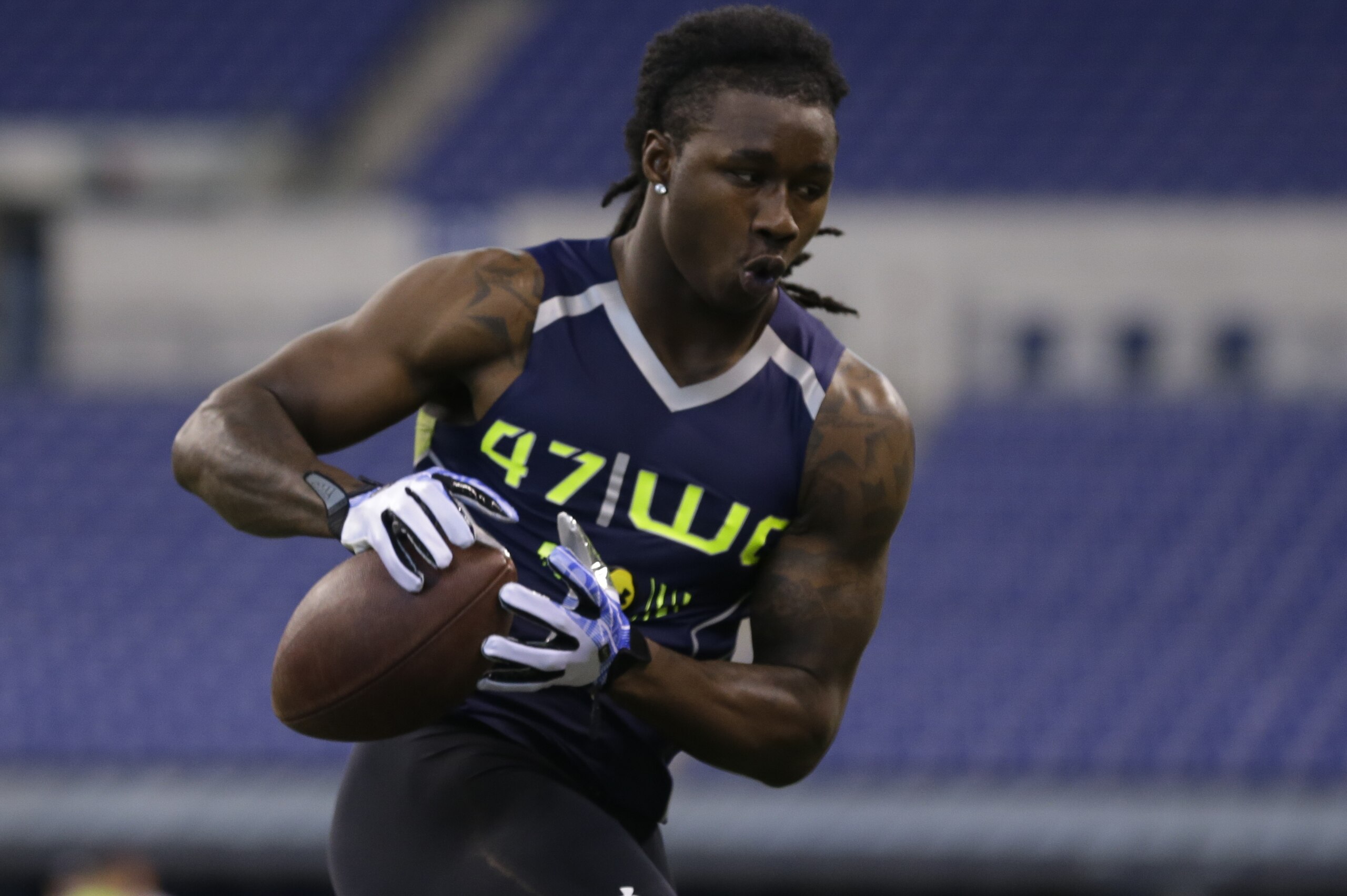 Clemson wide receiver Sammy Watkins makes a catch during a drill at the NFL football scouting combine in Indianapolis, Sunday, Feb. 23, 2014. (AP Photo/Michael Conroy)