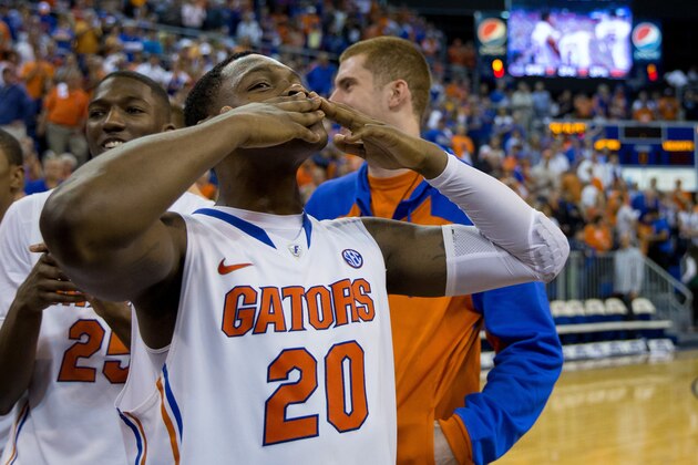 GAINESVILLE, FL - MARCH 08: Michael Frazier II #20 of the Florida Gators blows kisses to the crowd after they sang him 'happy birthday' after the game against the Kentucky Wildcats at the Stephen C. O'Connell Center on March 8, 2014 in Gainesville, Florida. (Photo by Rob Foldy/Getty Images)