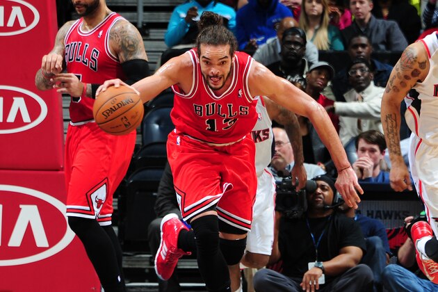 ATLANTA, GA - FEBRUARY 25: Joakim Noah #13 of the Chicago Bulls drives against the Atlanta Hawks on February 25, 2014 at Philips Arena in Atlanta, Georgia.  NOTE TO USER: User expressly acknowledges and agrees that, by downloading and/or using this Photograph, user is consenting to the terms and conditions of the Getty Images License Agreement. Mandatory Copyright Notice: Copyright 2014 NBAE (Photo by Scott Cunningham/NBAE via Getty Images)