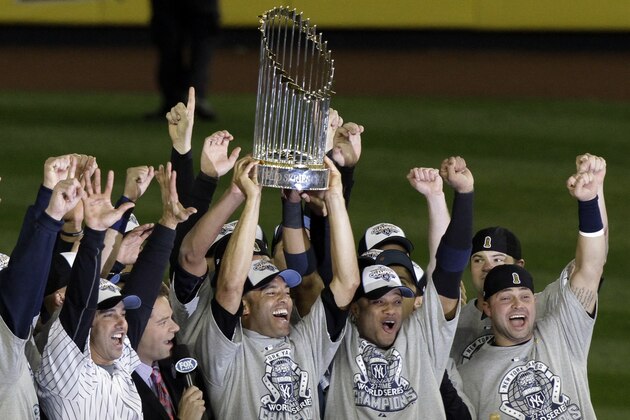 The New York Yankees celebrate after Game 6 of the Major League Baseball World Series against the Philadelphia Phillies Wednesday, Nov. 4, 2009, in New York. The Yankees won 7-3. (AP Photo/Kathy Willens)