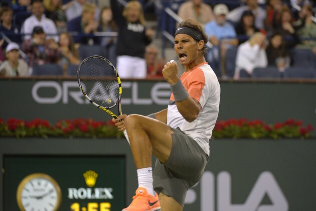 Rafael Nadal, of Spain, reacts to winning a point over Radek Stepanek, of the Czech Republic, in their match at the BNP Paribas Open tennis tournament, Saturday, March 8, 2014, in Indian Wells, Calif. Nadal won 2-6, 6-4, 7-5. (AP Photo/Mark J. Terrill)