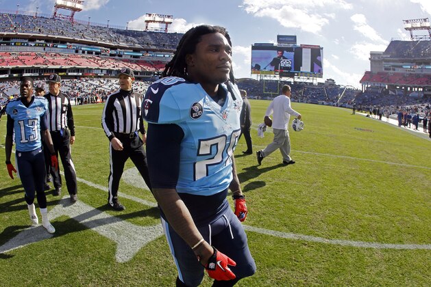 Tennessee Titans running back Chris Johnson (28) walks off the field before an NFL football game against the Houston Texans Sunday, Dec. 29, 2013, in Nashville, Tenn. (AP Photo/Wade Payne)