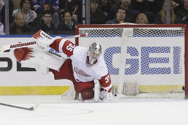 Detroit Red Wings goalie Jimmy Howard (35) reacts as a puck shot by New York Rangers' Chris Kreider gets past him for a goal during the third period of an NHL hockey game Sunday, March 9, 2014, in New York. The Rangers won the game 3-0. (AP Photo/Frank Franklin II)