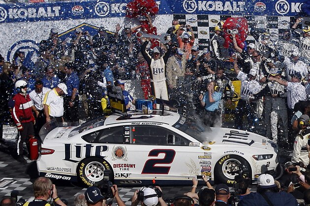 Brad Keselowski celebrates in victory lane after winning a NASCAR Sprint Cup Series auto race, Sunday, March 9, 2014, in Las Vegas. (AP Photo/Isaac Brekken)
