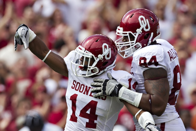 DALLAS, TX - OCTOBER 8:   Aaron Colvin #15 of the Oklahoma Sooners  celebrates after a big play against the Texas Longhorns at the Cotton Bowl on October 8, 2011 in Dallas, Texas.  The Sooners defeated the Longhorns 55 to 17.  (Photo by Wesley Hitt/Getty Images)