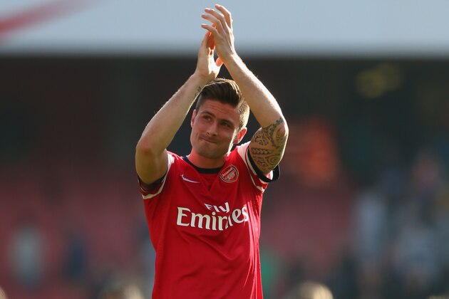 LONDON, ENGLAND - MARCH 08:  Olivier Giroud of Arsenal applauds the crowd at the end of the FA Cup Quarter-Final match between Arsenal and Everton at Emirates Stadium on March 8, 2014 in London, England.  (Photo by Paul Gilham/Getty Images)