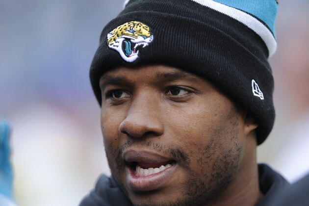 Injured Jacksonville Jaguars running back Maurice Jones-Drew watches from the bench during the first half of an NFL football game against the Buffalo Bills in Jacksonville, Fla., Sunday, Dec. 15, 2013.(AP Photo/Stephen Morton)