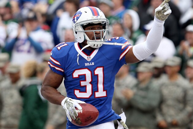 Nov 17, 2013; Orchard Park, NY, USA; Buffalo Bills free safety Jairus Byrd (31) celebrates his first half interception against the New York Jets at Ralph Wilson Stadium. Mandatory Credit: Timothy T. Ludwig-USA TODAY Sports