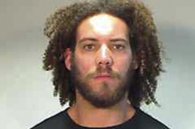 In this photo provided by the Monroe County Sheriff's Office, Baltimore Ravens tackle Jah Reid is shown in a mug shot Sunday, March 9, 2014 following his arrest for two counts of battery in Key West, Fla. Reid faces misdemeanor charges following a fight at the Red Garter strip club in Key West. (AP Photo/Key West Sheriff's Office)