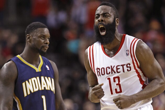 Houston Rockets' James Harden (13) screams after hitting a 3-point shot as Indiana Pacers' Lance Stephenson (1) looks off in the second half of an NBA basketball game Friday, March 7, 2014, in Houston. (AP Photo/Pat Sullivan)