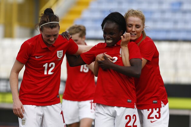 LARNACA, CYPRUS - MARCH 07:  Eniola Aluko (2nd,R) of England celebrates scoring a goal with team-mates during the Cyprus Cup match between England and Finalnd at GSZ stadium on March 7, 2014 in Larnaca, Cyprus.  (Photo by Andrew Caballero-Reynolds/Getty Images)