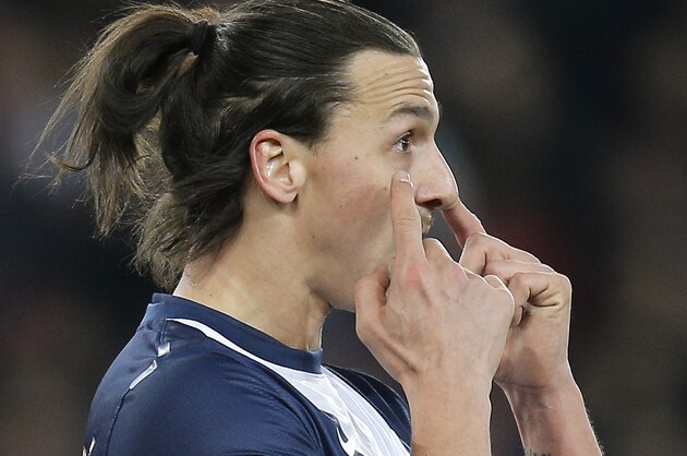 Paris Saint Germain's Zlatan Ibrahimovic of Sweden gestures to his teammates during the French League One soccer match against Marseille, at the Parc des Princes stadium, in Paris, Sunday, March 2 , 2014. (AP Photo/Lionel Cironneau)
