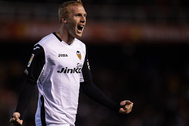 VALENCIA, SPAIN - DECEMBER 22:  Jeremy Mathieu of Valencia celebrates after scoring during the La Liga match between Valencia CF and Real Madrid CF at Estadio Mestalla on December 22, 2013 in Valencia, Spain.  (Photo by Manuel Queimadelos Alonso/Getty Images)