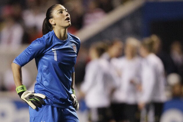 U.S. women's national team goalie Hope Solo (1) reacts after Germany women's national team forward Anja Mittag (11) scoring a goal during the first half of an international friendly soccer match game on Saturday, Oct. 20, 2012, in Bridgeview, Ill. (AP Photo/Nam Y. Huh)