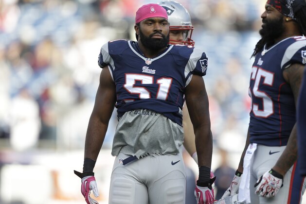 New England Patriots outside linebacker Jerod Mayo (51), left, and Patriots middle linebacker Brandon Spikes (55), right, warm up on the field before an NFL football game against the New Orleans Saints Sunday, Oct.13, 2013, in Foxborough, Mass. The Patriots beat the Saints 30-27. (AP Photo/Steven Senne)