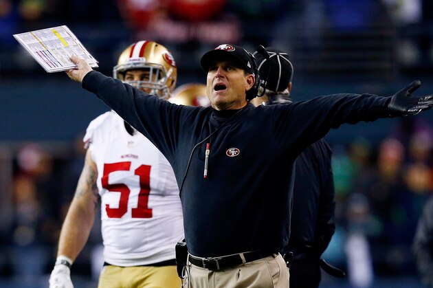 SEATTLE, WA - JANUARY 19: Head coach Jim Harbaugh of the San Francisco 49ers reacts during the 2014 NFC Championship against the Seattle Seahawks at CenturyLink Field on January 19, 2014 in Seattle, Washington.  (Photo by Tom Pennington/Getty Images)