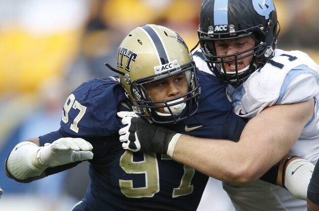 Pittsburgh defensive lineman Aaron Donald (97) in action in an NCAA football game between Pittsburgh and North Carolina, Saturday, Nov. 16, 2013 in Pittsburgh. (AP Photo/Keith Srakocic)