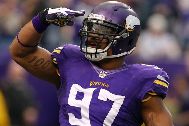 MINNEAPOLIS, MN - DECEMBER 29:   Everson Griffen #97 of the Minnesota Vikings celebrates his sack of Matthew Stafford #9 of the Detroit Lions on December 29, 2013 at Mall of America Field at the Hubert H. Humphrey Metrodome in Minneapolis, Minnesota. (Photo by Adam Bettcher/Getty Images)