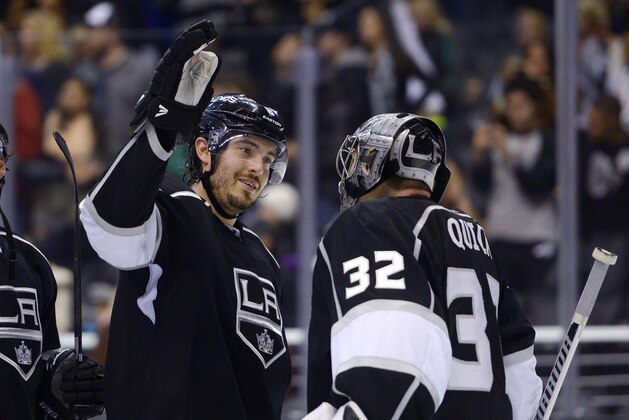 Los Angeles Kings defenseman Drew Doughty, left, congratulates goalie Jonathan Quick after an NHL hockey game against the Carolina Hurricanes, Saturday, March 1, 2014, in Los Angeles. The Kings won 3-1.(AP Photo/Mark J. Terrill)