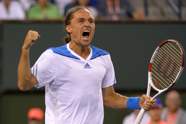 Alexandr Dolgopolov, of Ukraine, celebrates as he defeats Rafael Nadal, of Spain, their match at the BNP Paribas Open tennis tournament, Monday, March 10, 2014, in Indian Wells, Calif. Dolgopolov won 6-3, 3-6, 7-6 (5). (AP Photo/Mark J. Terrill)