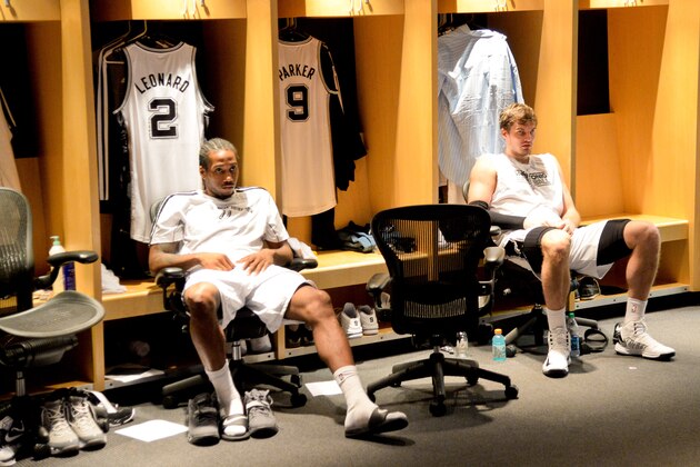 SAN ANTONIO, TX - JUNE 13: Tiago Splitter #22, right, and Kawhi Leonard #2 of the San Antonio Spurs sit in the locker room before playing against the Miami Heat during Game Four of the 2013 NBA Finals on June 13, 2013 at AT&T Center in San Antonio, Texas. NOTE TO USER: User expressly acknowledges and agrees that, by downloading and or using this photograph, User is consenting to the terms and conditions of the Getty Images License Agreement. Mandatory Copyright Notice: Copyright 2013 NBAE (Photo by D. Clarke Evans/NBAE via Getty Images)
