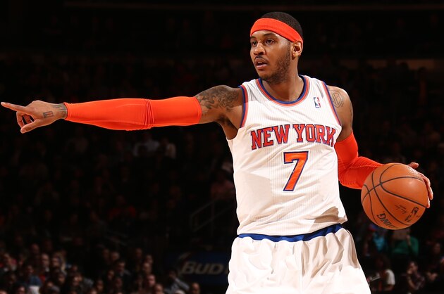 NEW YORK, NY - MARCH 10: Carmelo Anthony #7 of the New York Knicks directs his team against the Philadelphia 76ers during a game at Madison Square Garden in New York City. NOTE TO USER: User expressly acknowledges and agrees that, by downloading and or using this photograph, User is consenting to the terms and conditions of the Getty Images License Agreement. Mandatory Copyright Notice: Copyright 2014 NBAE (Photo by Nathaniel S. Butler/NBAE via Getty Images)