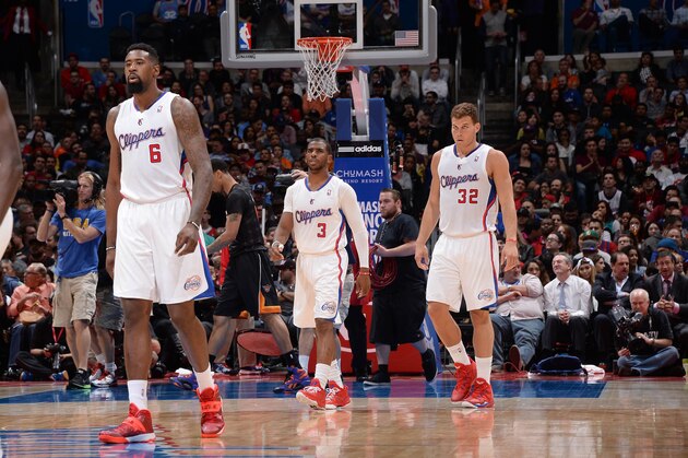 LOS ANGELES, CA - MARCH 10: DeAndre Jordan #6, Chris Paul #3, and Blake Griffin #32 of the Los Angeles Clippers during a game against the Phoenix Suns at Staples Center on March 10, 2014 in Los Angeles, California. NOTE TO USER: User expressly acknowledges and agrees that, by downloading and/or using this Photograph, user is consenting to the terms and conditions of the Getty Images License Agreement. Mandatory Copyright Notice: Copyright 2014 NBAE (Photo by Andrew D. Bernstein/NBAE via Getty Images)