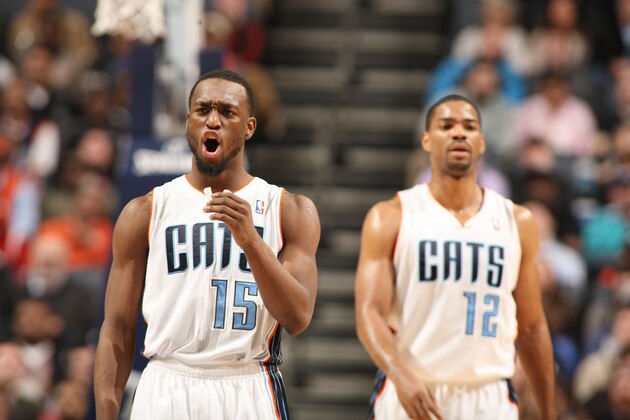 CHARLOTTE, NC - MARCH 5: Kemba Walker #15 of the Charlotte Bobcats celebrates the victory against the Indiana Pacers during the game at the Time Warner Cable Arena on March 5, 2014 in Charlotte, North Carolina. NOTE TO USER: User expressly acknowledges and agrees that, by downloading and or using this photograph, User is consenting to the terms and conditions of the Getty Images License Agreement. Mandatory Copyright Notice: Copyright 2014 NBAE (Photo by Kent Smith/NBAE via Getty Images) CHARLOTTE, NC - MARCH 5: Kemba Walker #15 of the Charlotte Bobcats celebrates the victory against the Indiana Pacers during the game at the Time Warner Cable Arena on March 5, 2014 in Charlotte, North Carolina. NOTE TO USER: User expressly acknowledges and agrees that, by downloading and or using this photograph, User is consenting to the terms and conditions of the Getty Images License Agreement. Mandatory Copyright Notice: Copyright 2014 NBAE (Photo by Kent Smith/NBAE via Getty Images)
