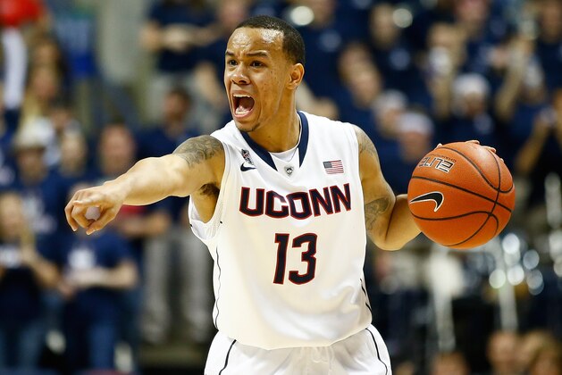 STORRS, CT - DECEMBER 02: Shabazz Napier #13 of the Connecticut Huskies yells to his teammate in the second half against the Florida Gators during the game at Harry A. Gampel Pavilion on December 2, 2013 in Storrs, Connecticut.  (Photo by Jared Wickerham/Getty Images)