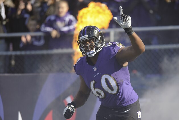 Baltimore Ravens tackle Eugene Monroe waves as he introduced before a NFL football game against the Cincinnati Bengals in Baltimore, Sunday, Nov. 10, 2013. (AP Photo/Nick Wass) Baltimore Ravens tackle Eugene Monroe waves as he introduced before a NFL football game against the Cincinnati Bengals in Baltimore, Sunday, Nov. 10, 2013. (AP Photo/Nick Wass)
