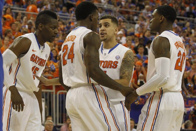 Mar 8, 2014; Gainesville, FL, USA; Florida Gators guard Scottie Wilbekin (5) huddles up with guard Michael Frazier II (20), forward Casey Prather (24) and forward Will Yeguete (15) against the Kentucky Wildcats during the first half at Stephen C. O'Connell Center. Mandatory Credit: Kim Klement-USA TODAY Sports Mar 8, 2014; Gainesville, FL, USA; Florida Gators guard Scottie Wilbekin (5) huddles up with guard Michael Frazier II (20), forward Casey Prather (24) and forward Will Yeguete (15) against the Kentucky Wildcats during the first half at Stephen C. O'Connell Center. Mandatory Credit: Kim Klement-USA TODAY Sports
