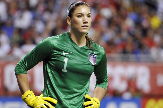 USA goalkeeper Hope Solo pauses on the field during the second half of an international friendly women's soccer match against Australia, Sunday, Oct. 20, 2013, in San Antonio. USA won 4-0. (AP Photo/Darren Abate)