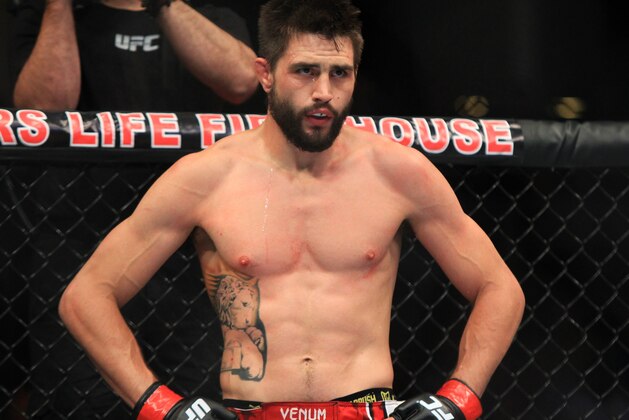Aug 28, 2013; Indianapolis, IN, USA; Carlos Condit (pictured) fights Martin Kampmann during UFC Fight NIght 27 at Bankers Life Fieldhouse. Mandatory Credit: Pat Lovell-USA TODAY Sports