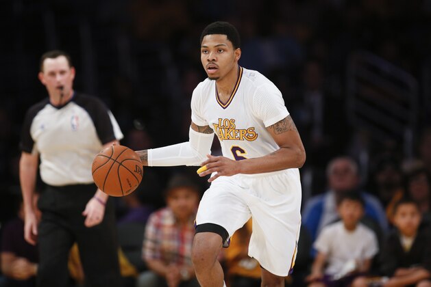 Los Angeles Lakers shooting guard Kent Bazemore dribbles the ball against the Oklahoma City Thunder during the second half of an NBA basketball game in Los Angeles, Sunday, March 9, 2014. The Lakers won 114-110. (AP Photo/Danny Moloshok) Los Angeles Lakers shooting guard Kent Bazemore dribbles the ball against the Oklahoma City Thunder during the second half of an NBA basketball game in Los Angeles, Sunday, March 9, 2014. The Lakers won 114-110. (AP Photo/Danny Moloshok)