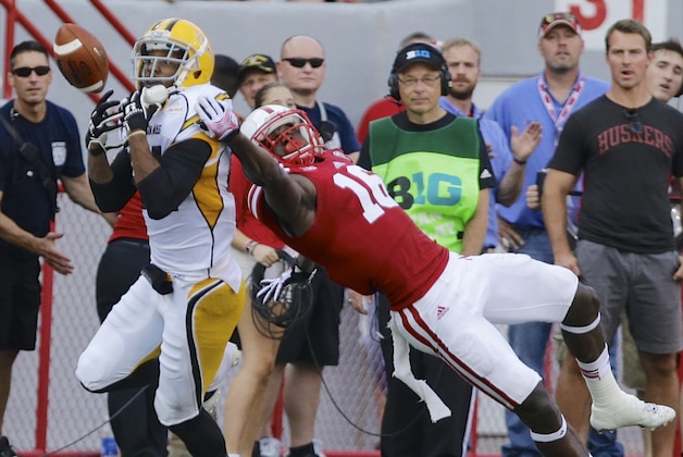 Nebraska cornerback Stanley Jean-Baptiste, right, breaks up a pass intended for Southern Mississippi wide receiver Rickey Bradley (81) in the first half of an NCAA college football game in Lincoln, Neb., Saturday, Sept. 7, 2013. (AP Photo/Nati Harnik)