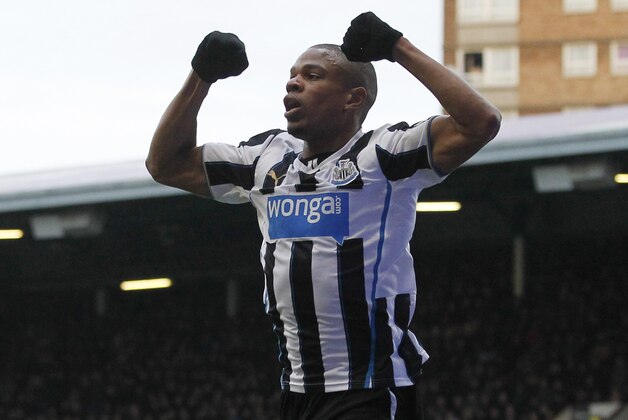 Newcastle United's Loic Remy celebrates his goal against  West Ham United during their English Premier League soccer match at Upton Park, London, Saturday, Jan. 18, 2014. (AP Photo/Sang Tan)